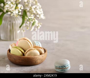 macaroons for dessert in a bowl on the table Stock Photo