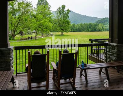Chairs at the  Oconaluftee Visitor Center overlooking the  Mountain Farm Museum in the Great Smoky Mountains National Park in North Carolina USA Stock Photo