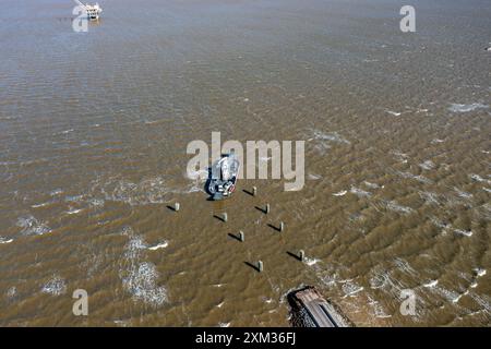 Images of the Mobile Bay Ferry - Fort Morgan Landing in very strong wind. The Mobile Bay Ferry crosses beautiful Mobile Bay, Alabama and connects SR 1 Stock Photo