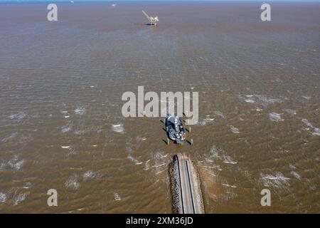 Images of the Mobile Bay Ferry - Fort Morgan Landing in very strong wind. The Mobile Bay Ferry crosses beautiful Mobile Bay, Alabama and connects SR 1 Stock Photo