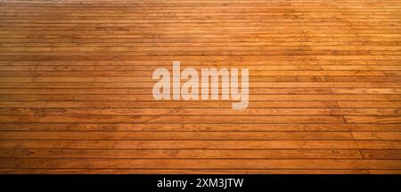 Aged striped deep brown plank wooden panel textured background Stock Photo