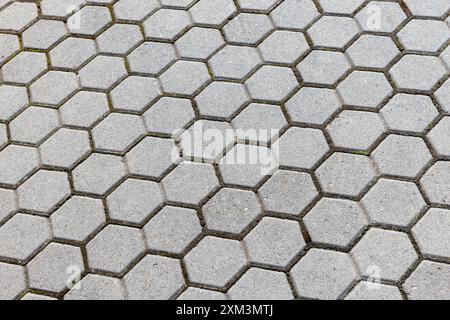 Gray concrete tiling background, hexagonal paving slabs pattern Stock Photo