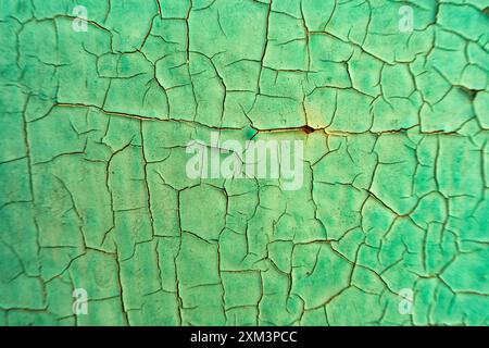 Weathered cracked green iron metallic with rusted textured background Stock Photo