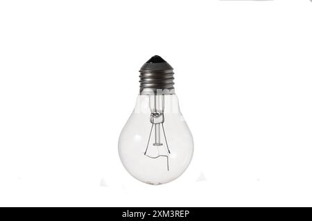 Close-up image of an incandescent lamp with a burned out spiral on a white background. Stock Photo