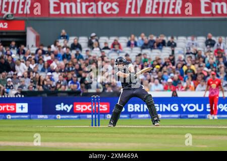 Old Trafford, Machester UK. Thursday 25th July, 2024. The Hundred: Manchester Originals Vs Welsh Fire at Emirates Old Trafford.Jamie Overton with a strike of the ball. Credit James Giblin. Stock Photo