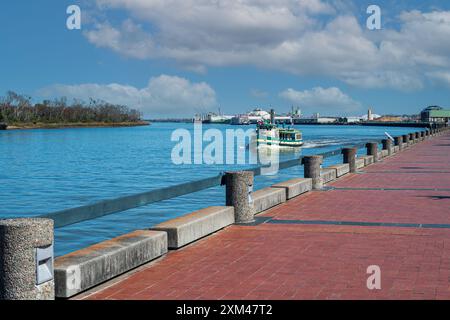 Savannah river walk. The Savannah River is an important commercial waterway in the southeastern US. The brick paved river walk is a popular walking, s Stock Photo