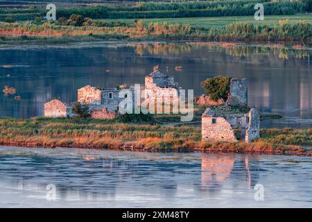 Salt pans at last sun rays Stock Photo