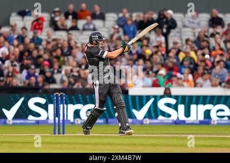 Old Trafford, Machester UK. Thursday 25th July, 2024. The Hundred: Manchester Originals Vs Welsh Fire at Emirates Old Trafford. Jamie Overton with a strike for four. Credit James Giblin. Stock Photo