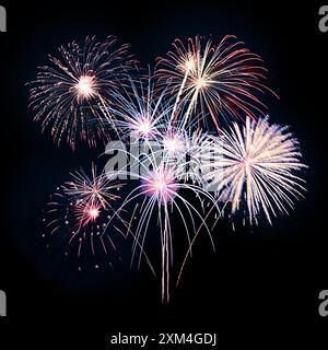 Composite of Fireworks Against Black Stock Photo