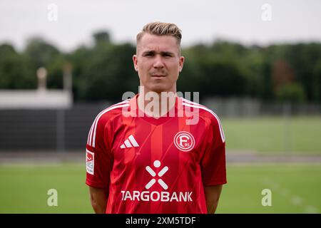 Duesseldorf, Germany. 25th July, 2024. Soccer: Bundesliga 2, Fortuna Düsseldorf photo shoot. Felix Klaus. Credit: Marius Becker/dpa - IMPORTANT NOTE: In accordance with the regulations of the DFL German Football League and the DFB German Football Association, it is prohibited to utilize or have utilized photographs taken in the stadium and/or of the match in the form of sequential images and/or video-like photo series./dpa/Alamy Live News Stock Photo