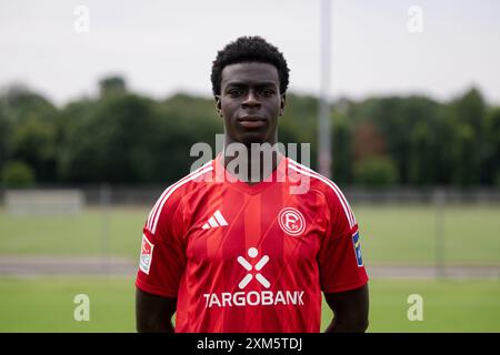 Duesseldorf, Germany. 25th July, 2024. Soccer: Bundesliga 2, Fortuna Düsseldorf photo shoot. Joshua Quarshie. Credit: Marius Becker/dpa - IMPORTANT NOTE: In accordance with the regulations of the DFL German Football League and the DFB German Football Association, it is prohibited to utilize or have utilized photographs taken in the stadium and/or of the match in the form of sequential images and/or video-like photo series./dpa/Alamy Live News Stock Photo