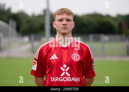 Duesseldorf, Germany. 25th July, 2024. Soccer: Bundesliga 2, Fortuna Düsseldorf photo shoot. Daniel Bunk. Credit: Marius Becker/dpa - IMPORTANT NOTE: In accordance with the regulations of the DFL German Football League and the DFB German Football Association, it is prohibited to utilize or have utilized photographs taken in the stadium and/or of the match in the form of sequential images and/or video-like photo series./dpa/Alamy Live News Stock Photo