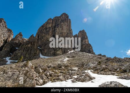 Immerse yourself in the alpine beauty of the Dolomites from the Sella Group trail, where each step reveals a breathtaking landscape of rugged peaks an Stock Photo