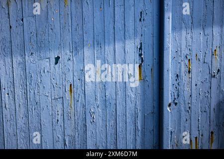 blue wooden door in sunlight Stock Photo