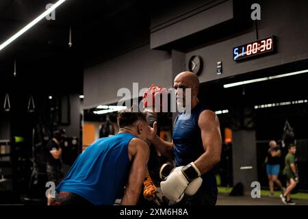 Boxers fighting in boxing training in the gym. Stock Photo