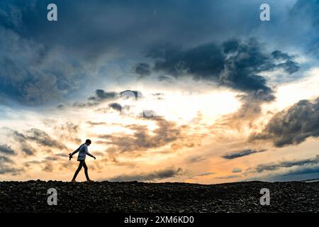 silhouette-of-a-person-at-dusk-stock-photo-alamy