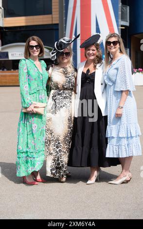 Ascot, Berkshire, UK. 26th July, 2024. Racegoers arriving at Ascot Racecourse in Berkshire on a sunny day for the QIPCO King George Friday. Credit: Maureen McLean/Alamy Live News Stock Photo