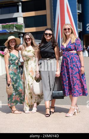 Ascot, Berkshire, UK. 26th July, 2024. Racegoers arriving at Ascot Racecourse in Berkshire on a sunny day for the QIPCO King George Friday. Credit: Maureen McLean/Alamy Live News Stock Photo