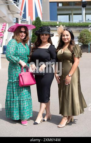 Ascot, Berkshire, UK. 26th July, 2024. Racegoers arriving at Ascot Racecourse in Berkshire on a sunny day for the QIPCO King George Friday. Credit: Maureen McLean/Alamy Live News Stock Photo