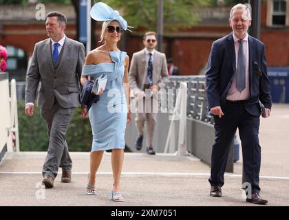 Racegoers arrive for the QIPCO King George Friday Raceday at Ascot Racecourse, Berkshire. Picture date: Friday July 26, 2024. Stock Photo