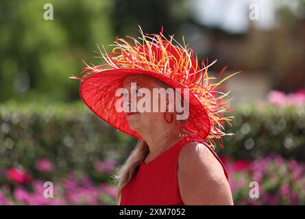 Racegoers arrive for the QIPCO King George Friday Raceday at Ascot Racecourse, Berkshire. Picture date: Friday July 26, 2024. Stock Photo