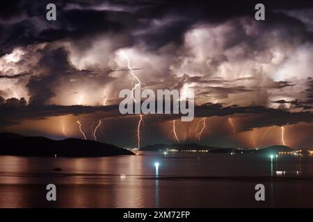 Dramatic stormy sky and lightning over Nha Trang Bay, Vietnam Stock Photo