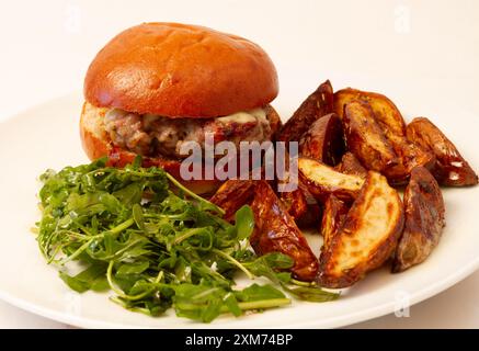 cheesy pork burger in brioche bun Stock Photo