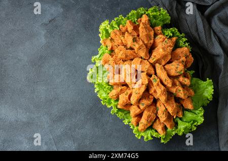 Raw meatballs with lettuce on rustic background, Turkish traditional food raw meat ( cig kofte ) Stock Photo