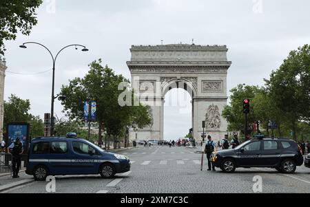 Paris, France. 26th July, 2024. French Police close the roads and step up security ahead of the Olympics opening ceremony tonight in Paris, France on Friday, July 26, 2024. Earlier today an arson attack on the French railway network has caused major delays ahead of the opening ceremony. Photo by Hugo Philpott/UPI Credit: UPI/Alamy Live News Stock Photo