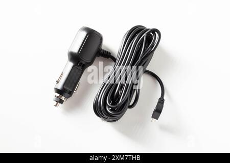 Electric adapter for charging into a car cigarette lighter on a white background, isolate Stock Photo