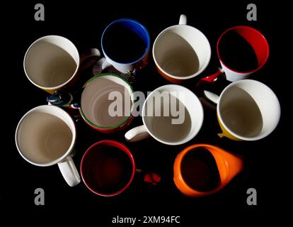 variety of empty ceramic mugs top view Stock Photo