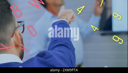 Image of numbers and letters over diverse business people in office Stock Photo