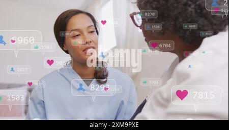 Social media engagement image over two women having conversation Stock Photo