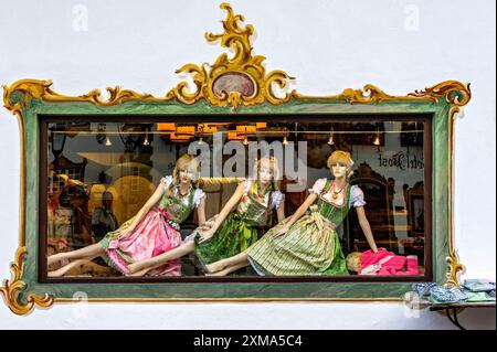 Shop window of fashion shop for traditional costumes, female mannequins, woman in dirndl, Wallgau, Werdenfelser Land, Upper Bavaria, Bavaria, Germany Stock Photo