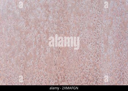 Full frame top view of old dirty rust metal plate is used as rust metal background texture in decorative art work. Stock Photo