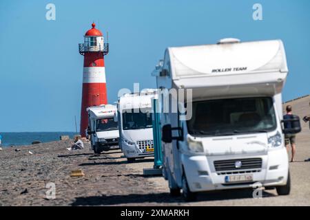 North Sea dyke near Westkapelle, Westkapelle Laag lighthouse, motorhome parking on the dyke, day caravan site, province of Zeeland, Walcheren Stock Photo