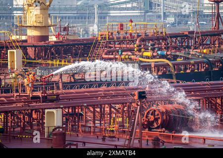 The crude oil tanker HOJO, in the seaport of Rotterdam, in the petroleum harbour, Europoort, ship personnel checking the fire extinguishing Stock Photo