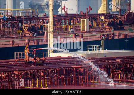 The crude oil tanker HOJO, in the seaport of Rotterdam, in the petroleum harbour, Europoort, ship personnel checking the fire extinguishing Stock Photo