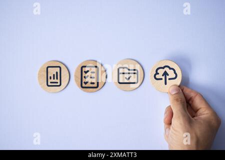 Digital Business Management: Accessing Corporate Data Online with Wooden Block Icon for Security and Efficiency in Office Technology Stock Photo