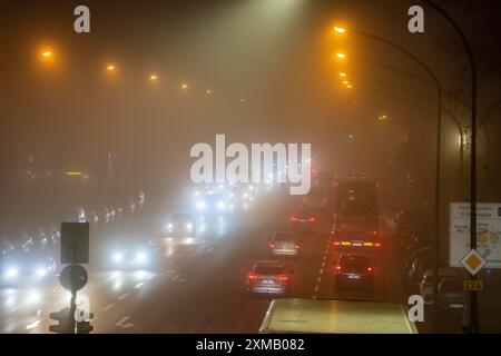 City centre traffic, fog, traffic jam, autumn, winter, evening rush hour traffic, Alfredstrasse B224, Essen, North Rhine-Westphalia, Germany Stock Photo