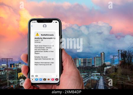 Symbolic image Cell Broadcast, warning service via mobile phone, by SMS, to all devices located in the area of radio cells, transmission masts, which Stock Photo