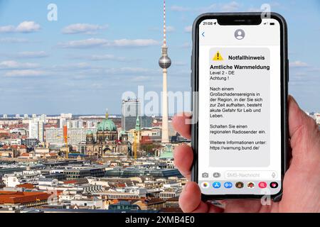 Symbolic image Cell Broadcast, warning service via mobile phone, by SMS, to all devices located in the area of radio cells, transmission masts, which Stock Photo