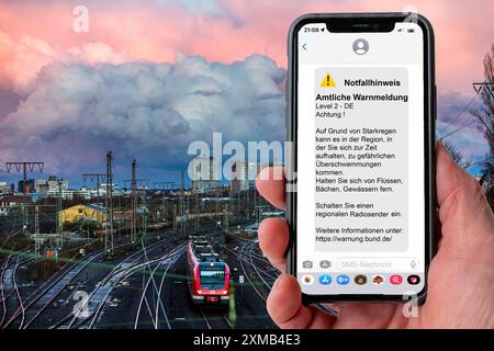 Symbolic image Cell Broadcast, warning service via mobile phone, by SMS, to all devices located in the area of radio cells, transmission masts, which Stock Photo