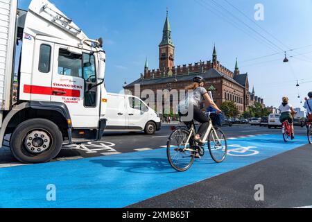 Cyclists on cycle paths, Radhuspladsen, City Hall Square, in the city centre of Copenhagen, considered the cycling capital of the world, 45 % of the Stock Photo