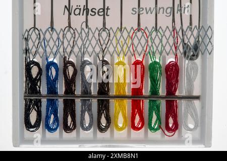 Sewing kit, sewing thread and sewing needles, already threaded, various colours, ready to sew, hotel amenities Stock Photo