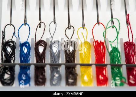 Sewing kit, sewing thread and sewing needles, already threaded, various colours, ready to sew, hotel amenities Stock Photo