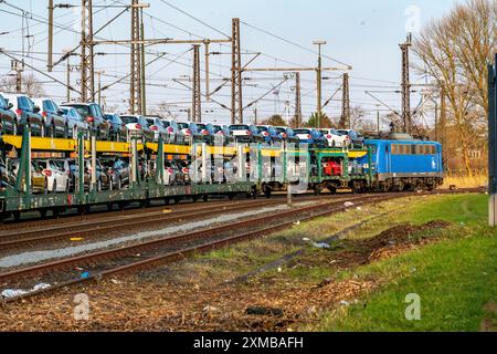 VW plant, Emden, new cars, car transporter, car train, goods train, with VW vehicles, Lower Saxony, Germany Stock Photo