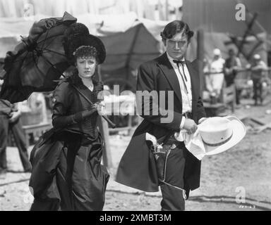 IRENE DUNNE and RICHARD DIX in a scene from CIMARRON 1931 Director WESLEY RUGGLES Novel EDNA FERBER Costume Design MAX REE Music MAX STEINER RKO Radio Pictures Stock Photo