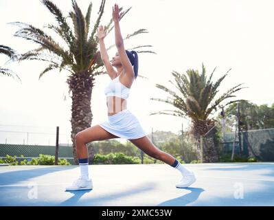 Fitness, stretching and tennis with woman on court getting ready for start of competition, game or match. Exercise, sports and warm up with African Stock Photo