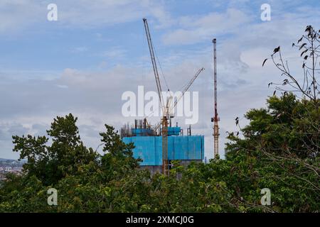 Cranes in a construction site in Pattaya, Thailand Stock Photo